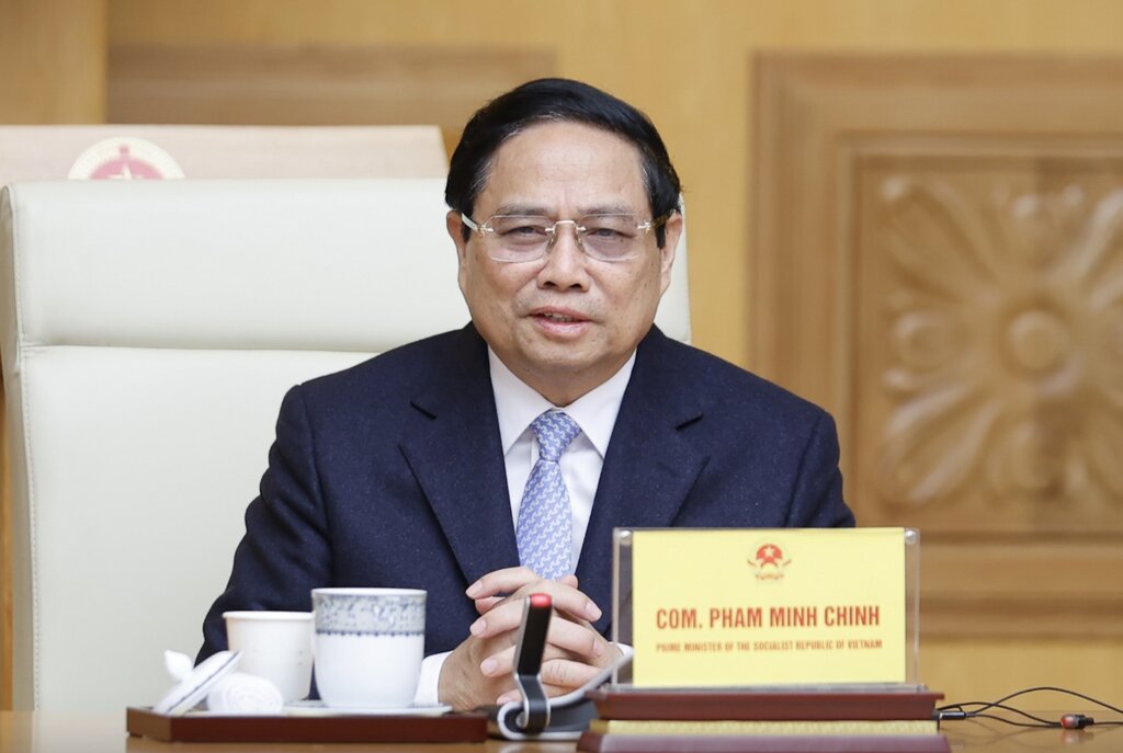 Politburo member and Prime Minister Pham Minh Chinh chaired a seminar with large Korean corporations and enterprises. Photo: VGP
