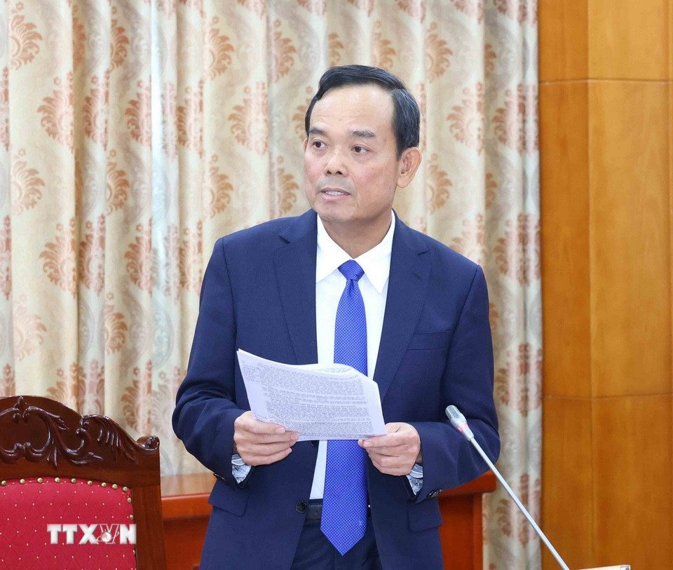 Bi thu Trung uong Dang, Truong Ban Chinh sach, chien luoc Trung uong Tran Luu Quang trinh bay bao cao. Anh: TTXVN