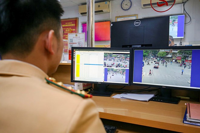 Muchos vehiculos reciben multas por congelarse dos o mas veces en un mes en Hanoi. Foto de la Policia de la ciudad de Hanoi