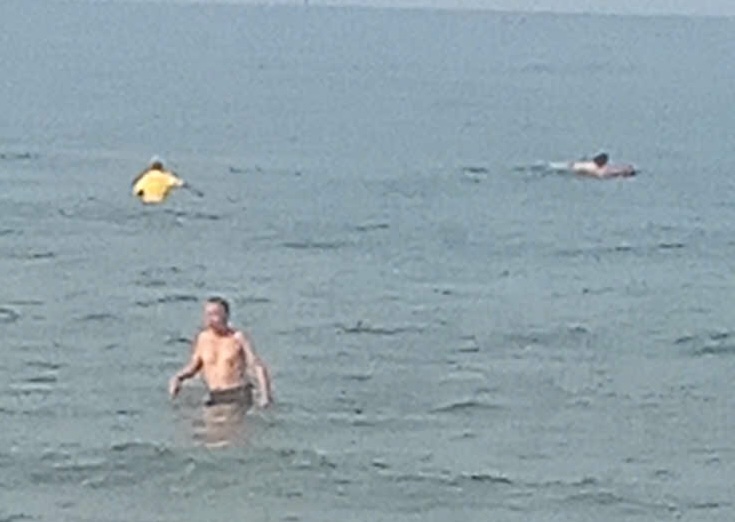 The male tourist was saved when swept away by waves. Photo: Thanh Long