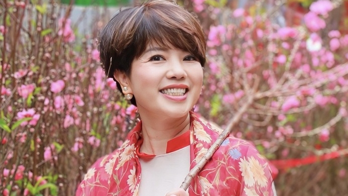 People's Artist Ngoc Huyen is the ex-wife of Meritorious Artist Chi Trung. Photo: Facebook character