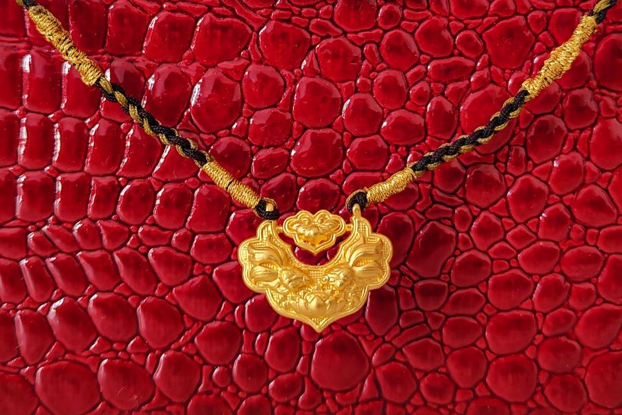 World gold price first exceeded the threshold of US $ 3,200/ounce on April 11. Photo: Xinhua