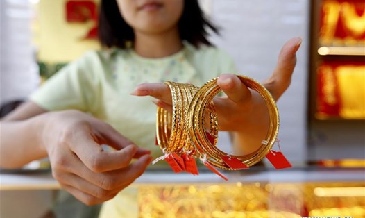 Giá vàng hôm nay (14.4) đạt mức kỷ lục mới là 3.245 USD/ounce. Ảnh: Xinhua