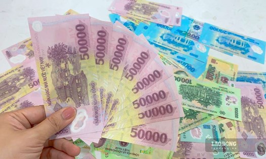 Mức lãi suất tiết kiệm 6 tháng đang dao động từ 3 - 5,7%/năm. Ảnh: Trà My