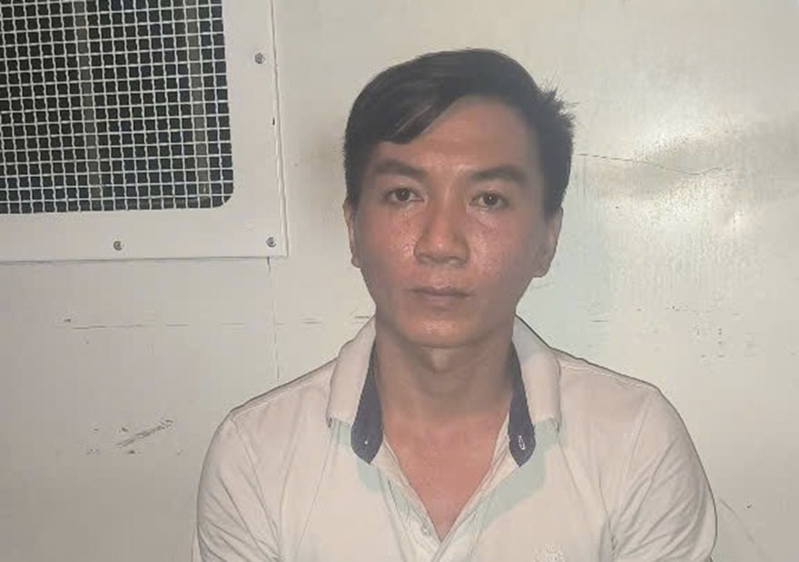 Doi tuong truy na Nguyen Van Thanh khi bi cong an bat giu. Anh: Cong an 