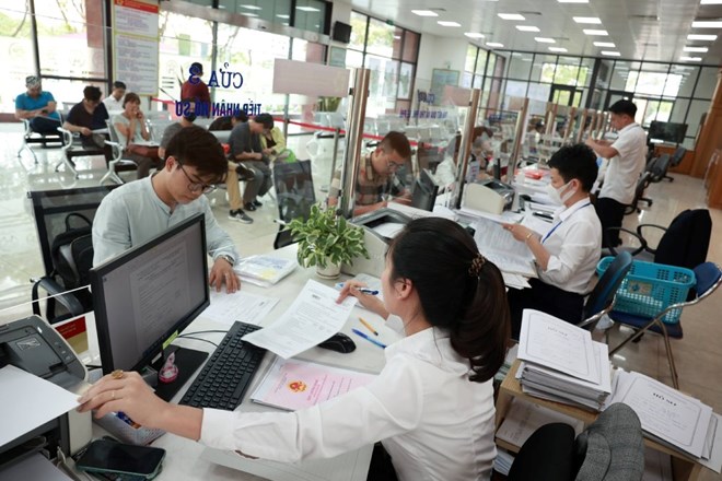Non-professional cadres at the commune level who meet the requirements of the task of participating in work in villages and residential groups. Illustrative photo: Hai Nguyen