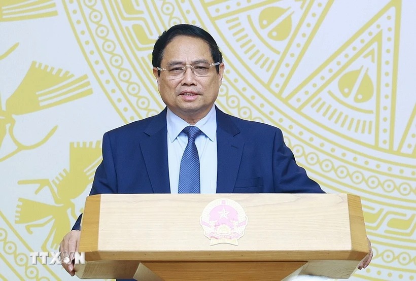 Politburo member and Prime Minister Pham Minh Chinh - Head of the Steering Committee for developing the Private Economic Development Project chaired the meeting. Photo: VNA