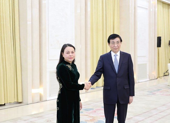 Vicepresidente - Secretario General del Comite Central de Vietnam Fatherland Front Nguyen Thi Thu Ha se reune con el Presidente de la Union principal de China. Foto: Quang Vinh