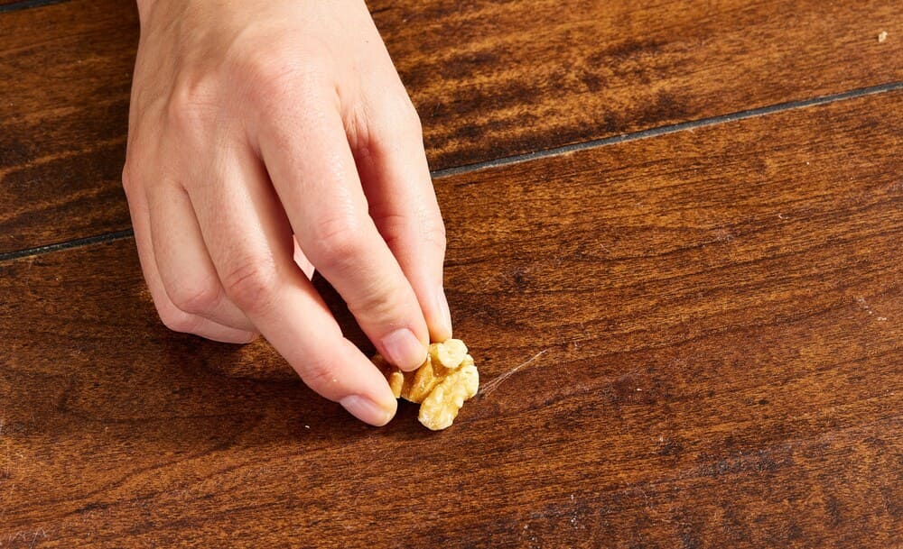 Try using walnuts to treat small scratches on wooden furniture. Photo: Dat