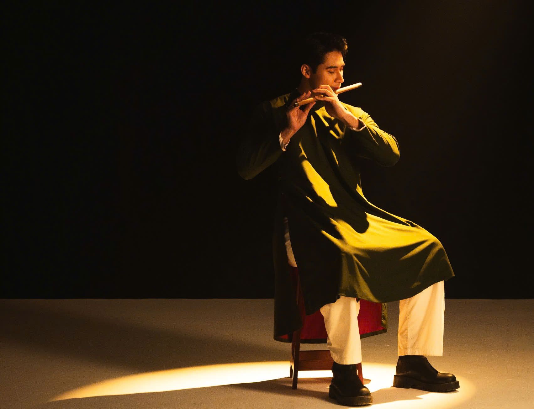 Mr. Tuan Ngoc blows the whistle in the new MV. Photo: Sen Vang.