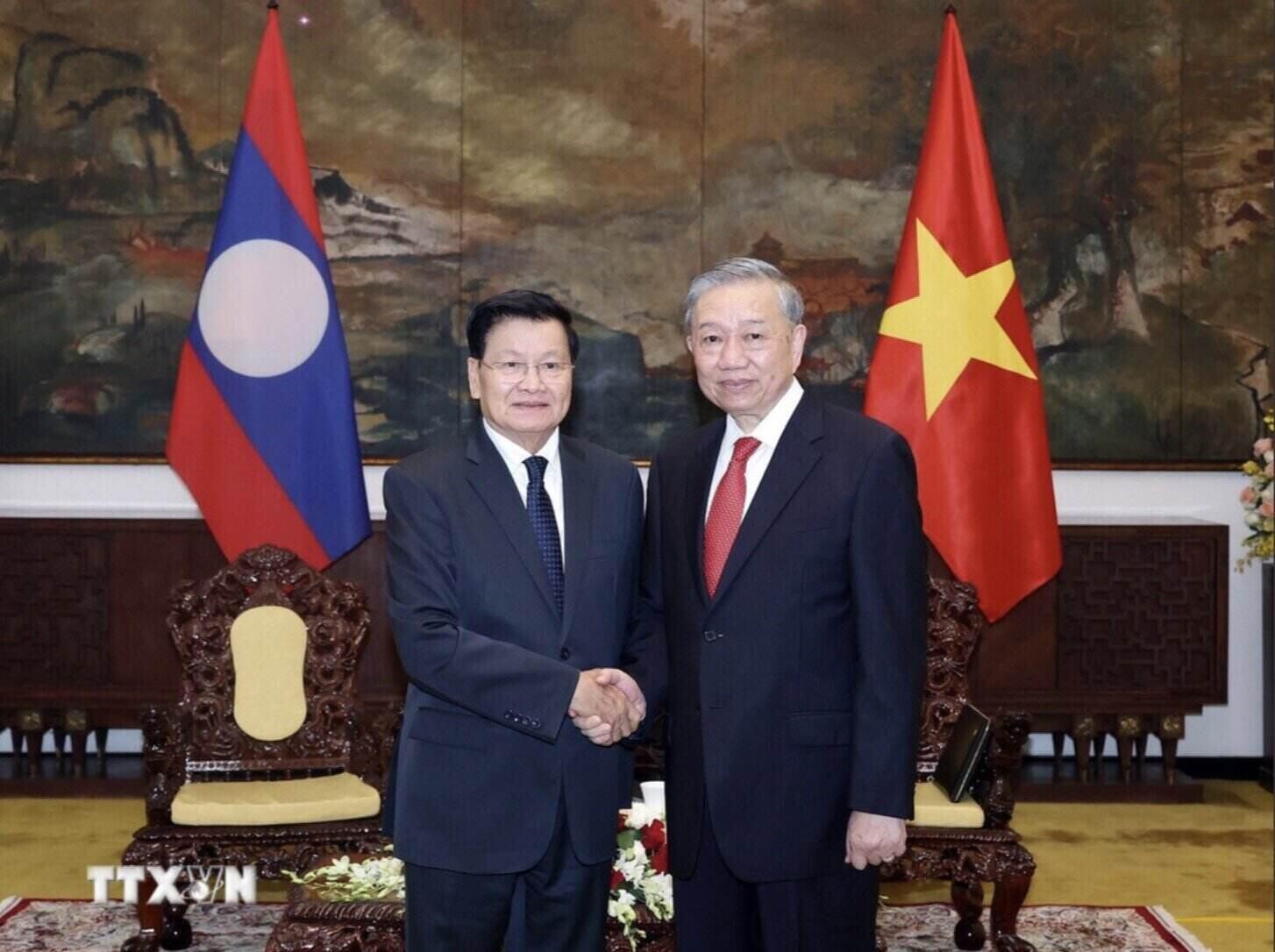 El Secretario General de la Republica Lao, To Lam, y el Secretario General, el Presidente de Laos, Thongloun Sisoulith. Imagen de la pagina web de la organizacion