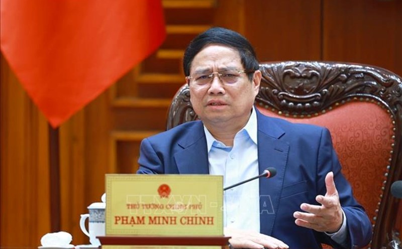 Politburo member and Prime Minister Pham Minh Chinh chaired a meeting on US counterpart tariffs. Photo: VNA