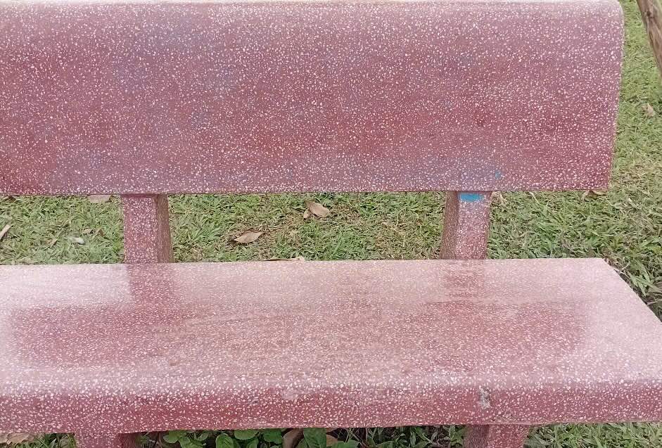 The content of billboards and castoos advertising on stone benches in the park has been deleted by local authorities. Photo: Cong Sang