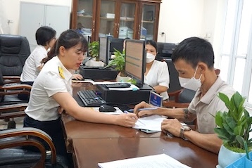 The tax authority deploys and propagates to remove difficulties and support the recovery of production and business activities. Photo: Tax Department