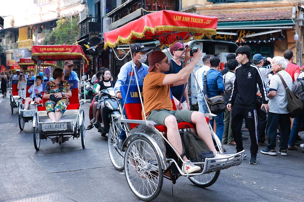 International visitors visit Hanoi's Old Quarter. Photo: Hai Nguyen