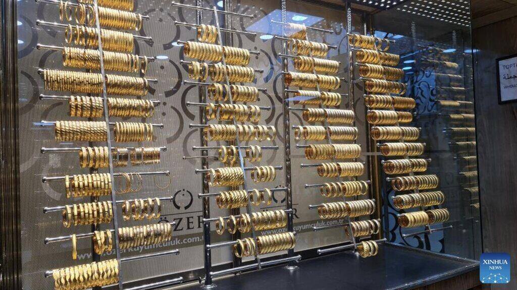 World gold prices are at their lowest level in more than 3 weeks. Photo: Xinhua