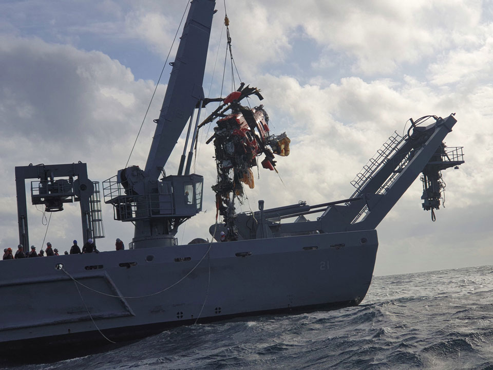 A Japanese helicopter that also had an accident at sea in 2019 is being salvaged. Photo: AFP
