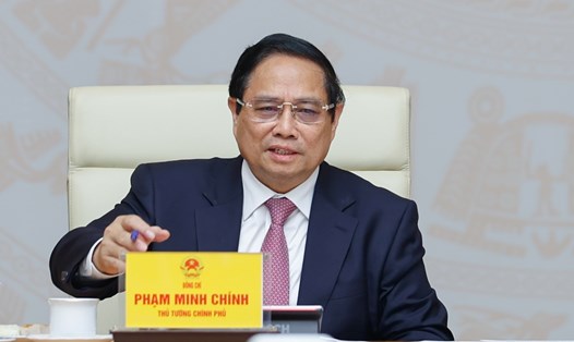 Ủy viên Bộ Chính trị, Thủ tướng Chính phủ Phạm Minh Chính chủ trì cuộc họp về cập nhật tình hình và giải pháp ứng phó với chính sách thuế quan của Mỹ, ngày 7.4.2025. Ảnh: TTXVN