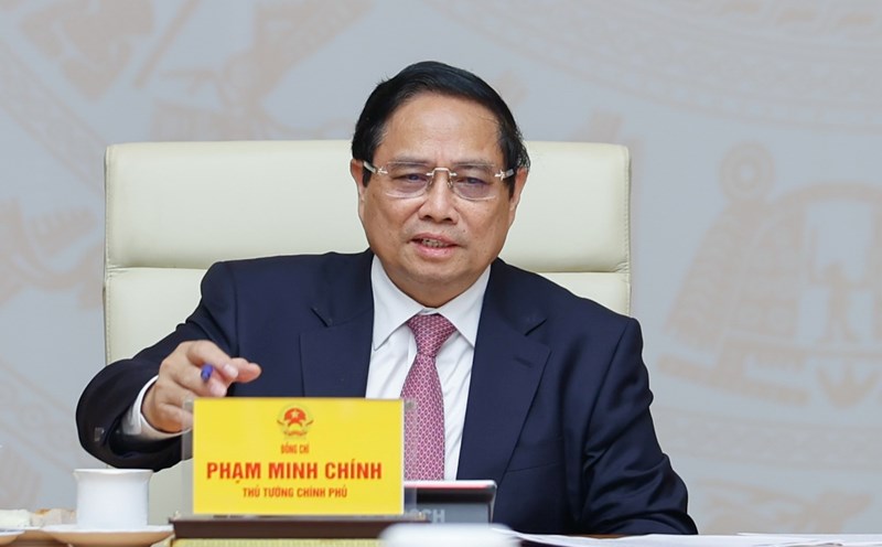Politburo member and Prime Minister Pham Minh Chinh chaired a meeting on updating the situation and solutions to respond to US tariff policies, on April 7, 2025. Photo: VNA