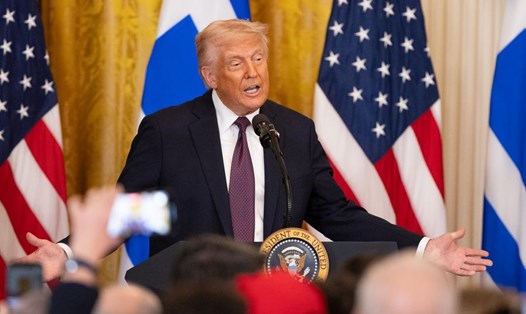 Chính sách áp thuế của Tổng thống Mỹ Donald Trump với 75 đối tác được tạm hoãn trong 90 ngày. Ảnh: Xinhua