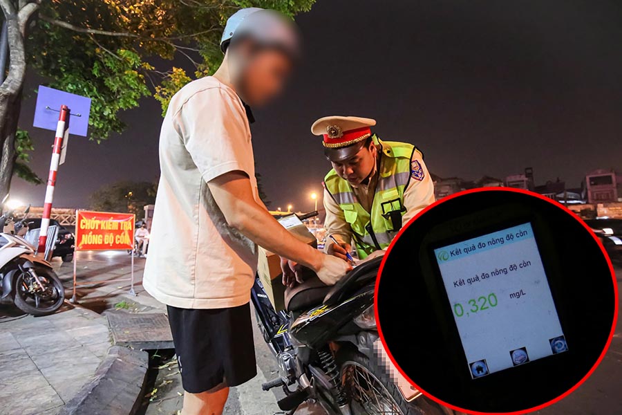 Nam thanh niên lái xe môtô đi giao hàng bị phạt nặng do vi phạm nồng độ cồn. Ảnh: Tô Thế