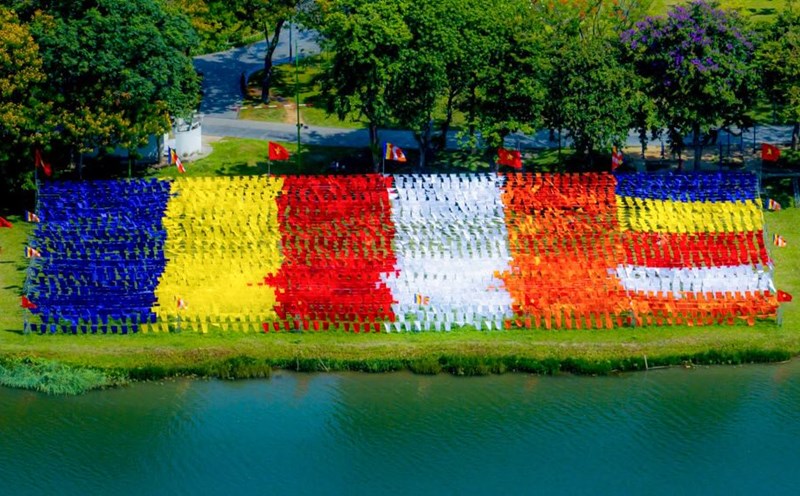 A giant Buddhist flag was erected on the banks of the Huong River, Hue City.