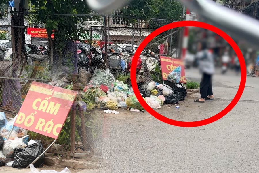 In less than 30 minutes, nearly a dozen people dumped garbage in violation of regulations in the central district of Hanoi
