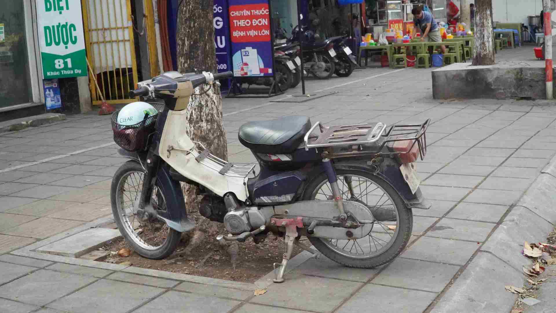 La inspeccion de emisiones de motocicletas para eliminar los vehiculos que no cumplen con los estandares. Imagen de la ciudad de Xuanzang