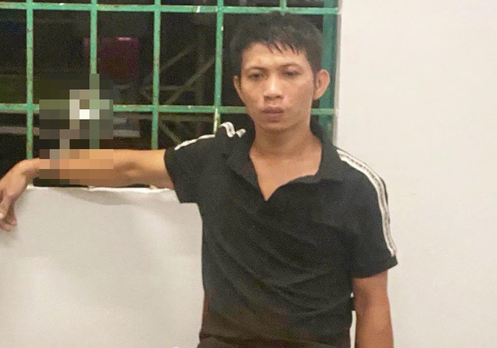 Đối tượng truy nã khi bị bắt. Ảnh: Công an