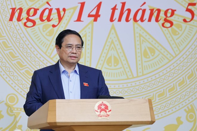 Miembro de Politburo, declaro el primer ministro Pham Minh Chinh, combatiendo el contrabando, los fraudes comerciales, los bienes falsos ... es un trabajo importante de todo el sistema politico. Foto: VGP/NHAT BAC