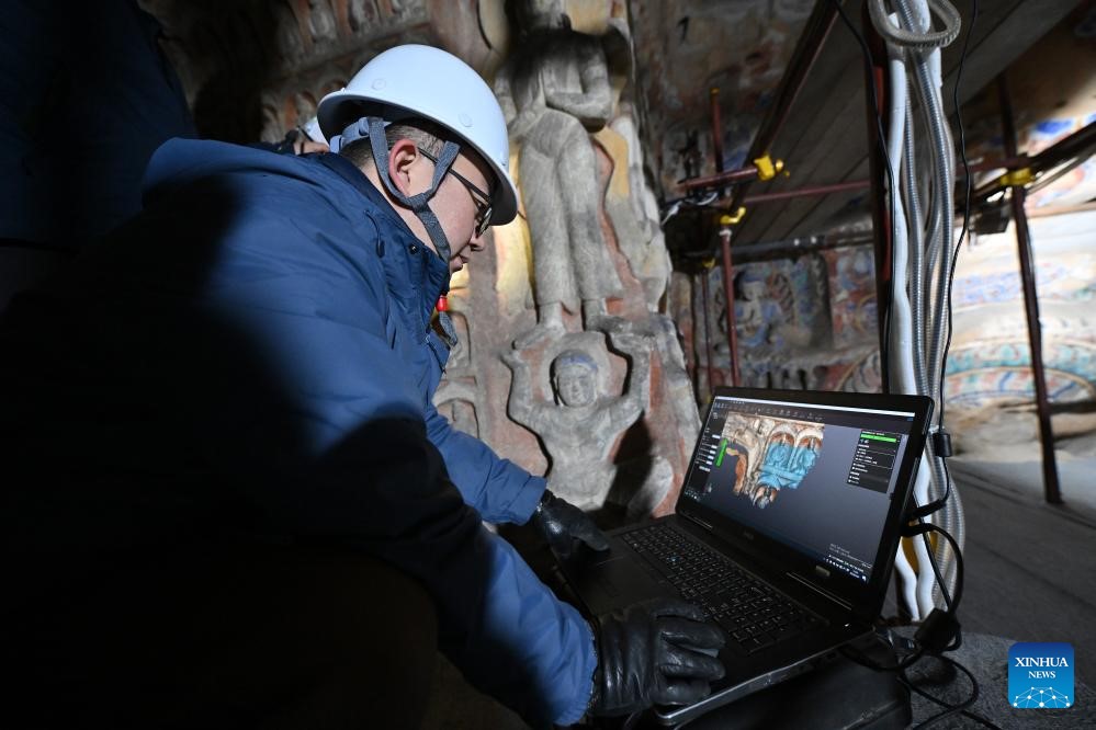 AI is not a human replacement for performance art - but a means for people to better fulfill their role in heritage conservation. Photo: Xinhua