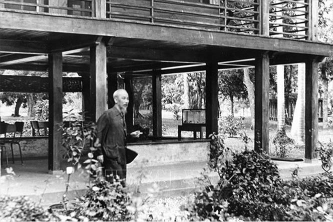 Uncle Ho next to the stilt house where Ngu lived and worked from May58 to August 2019. Photo: VNA documents