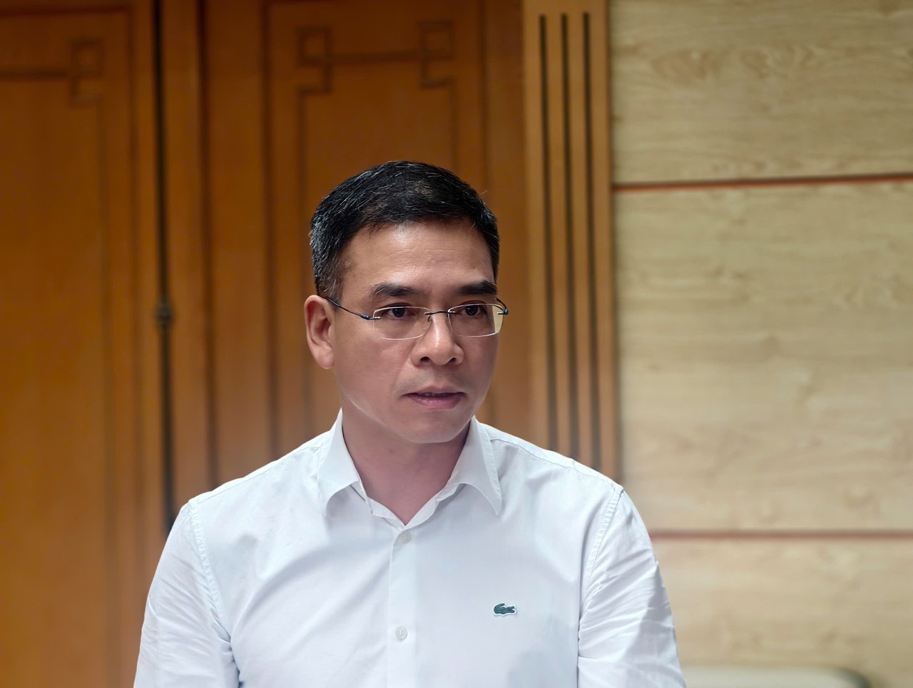 Dr. Ha Anh Duc - Director del Departamento de Gestion de Examen Medico, Ministerio de Salud, dijo que administrara a los medicos con codigo de identificacion. Foto: Tuan Dung