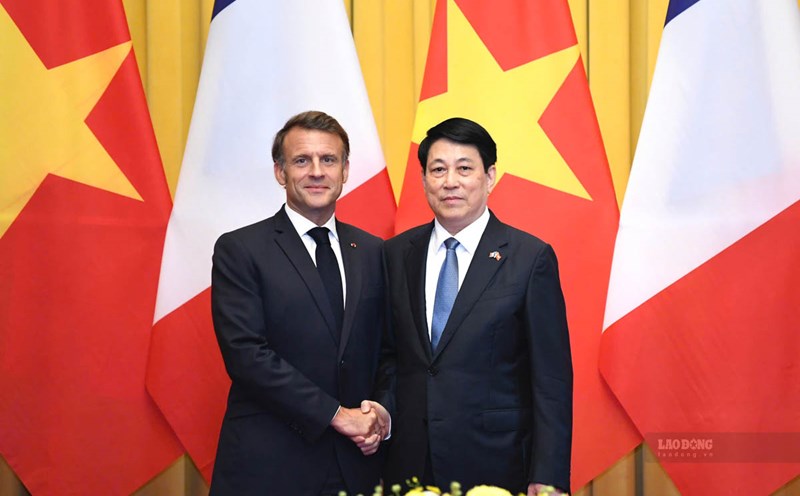 Politburo member, President Luong Cuong and French President Emmanuel Macron. Photo: Hai Nguyen