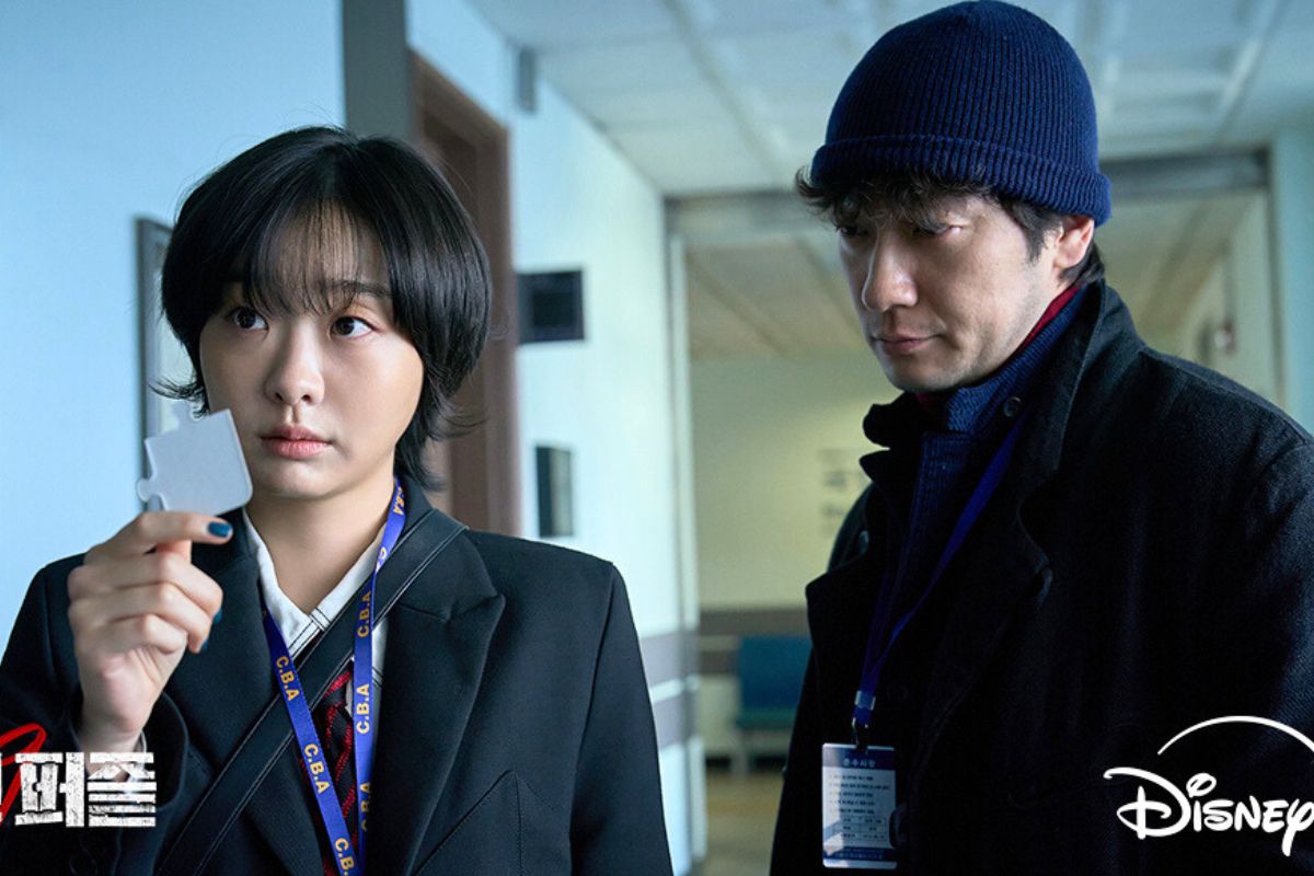 Kim Da Mi and Son Suk Koo in the movie Nine Puzzles. Photo: Disney+ producer