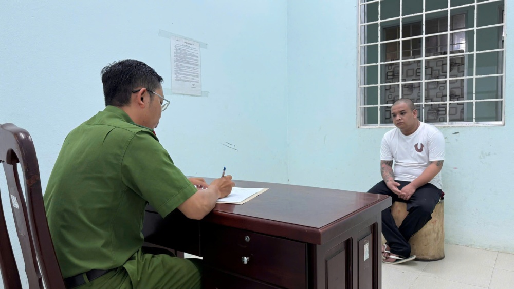 Luc luong chuc nang lay loi khai doi tuong Nguyen Thanh Cong. Anh: Tien Dung