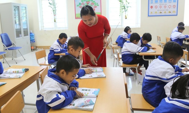 Educacion 24h: Hanoi establecio 15 grupos de examenes de graduacion de la escuela secundaria. Foto: bich ha