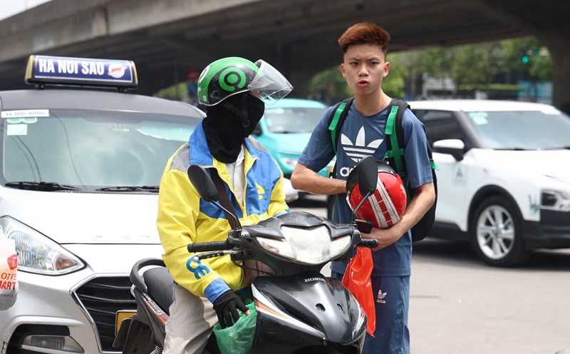 Technology motorbike taxi waiting for guests to return to the capital after a long holiday