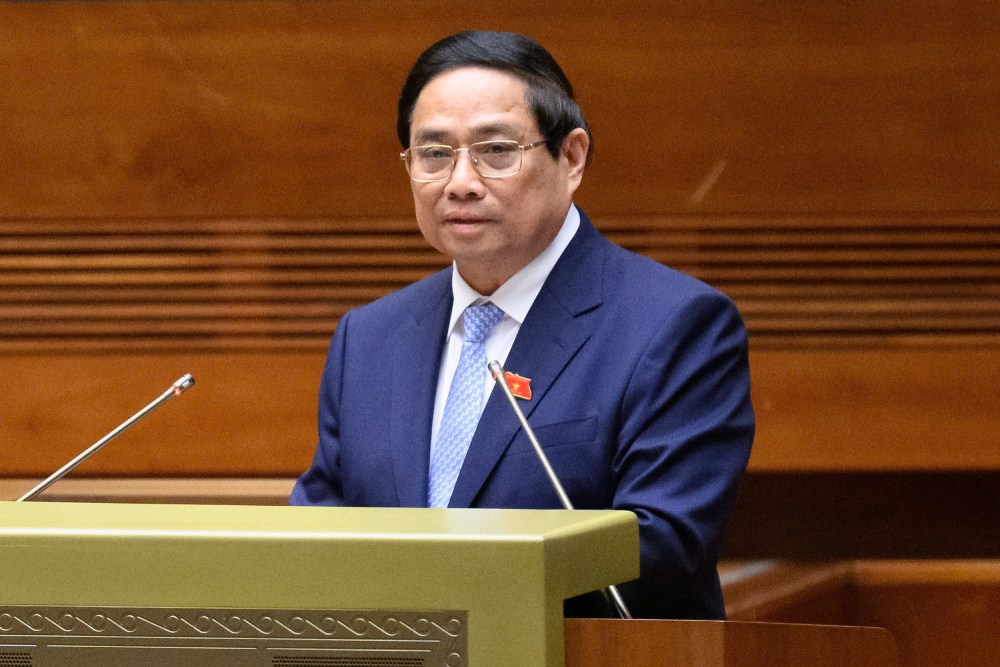 Politburo member and Prime Minister Pham Minh Chinh reported to the National Assembly on the socio-economic situation. Photo: Quochoi.vn