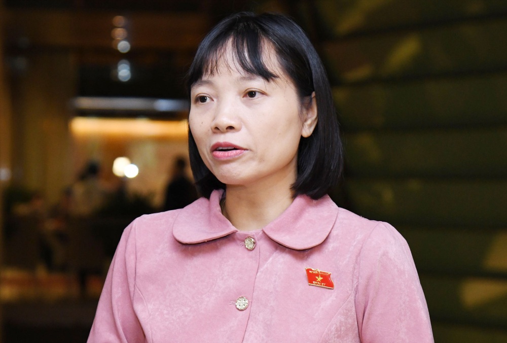 Delegate Nguyen Thi Viet Nga (Hai Duong Delegation) said that Resolution 68 is a historic turning point in promoting private economic development. Photo: Pham Dong