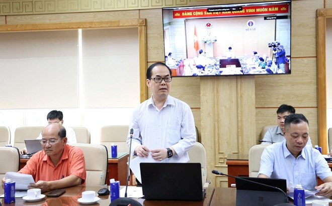Deputy Director of the Department of Drug Administration Ta Manh Hung reported on the management of drug quality, pharmaceutical ingredients and the fight against fake drugs and poor quality drugs. Photo: Tran Minh