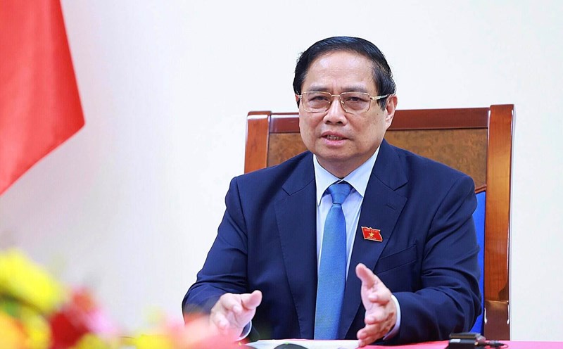 Politburo member and Prime Minister Pham Minh Chinh held a phone call with PAP Secretary General and Singapore Prime Minister Lawrence Wong. Photo: VGP