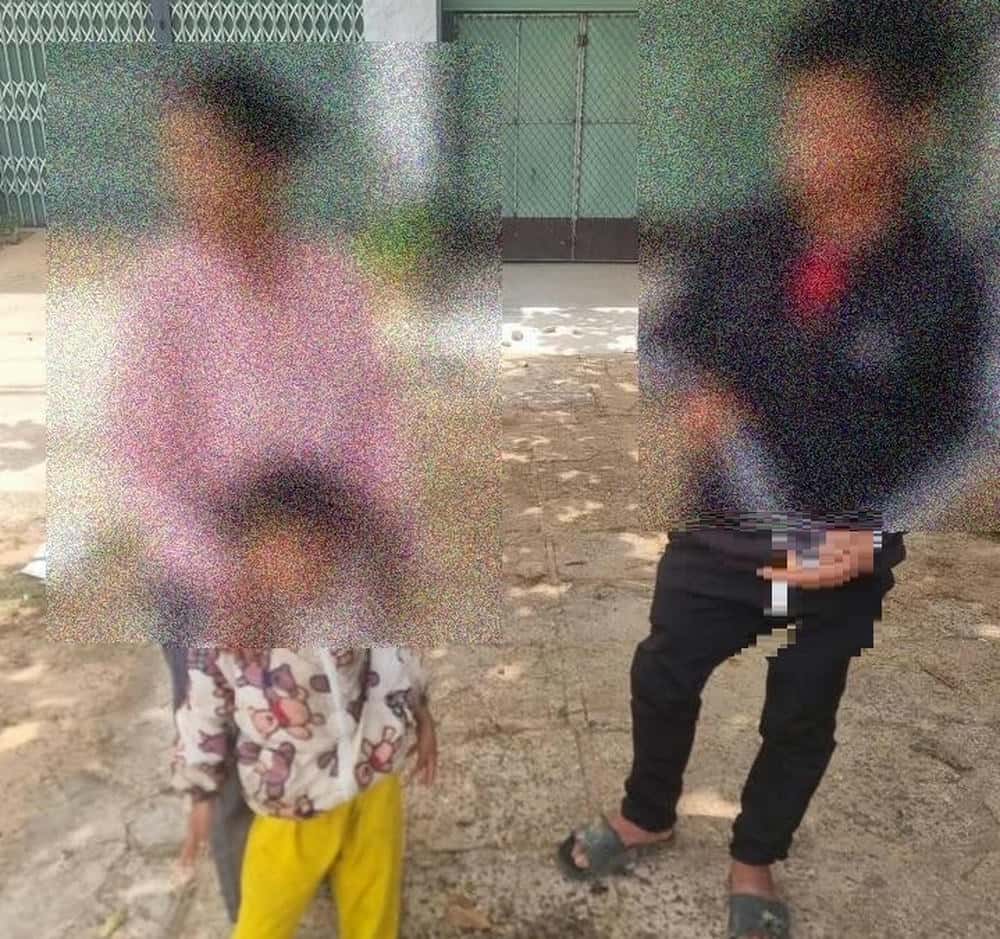 Hai cháu nhỏ đi lạc (bìa trái) được cơ quan công an hỗ trợ đưa về nhà an toàn. Ảnh: Công an cung cấp