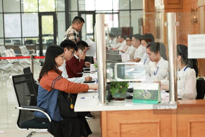 A partir del 16 de junio, la gente de Hai Duong lleva a cabo procedimientos administrativos en la sede de las comunas y salas. Obra de arte: Hai Nguyen