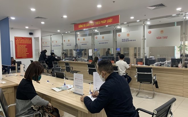 Hai Duong transmite la nomina, convierte el modelo de gobierno local. Obra de arte: Tran Vuong