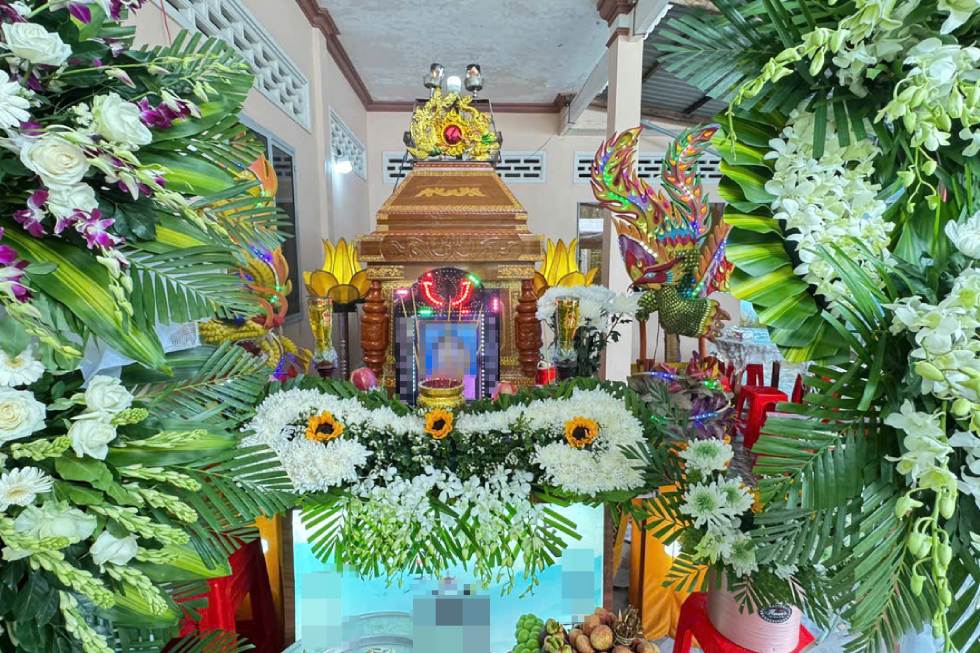 Sau vu tai nan, vo va 2 con cua anh Quy da mat. Anh: Quang Tuyen