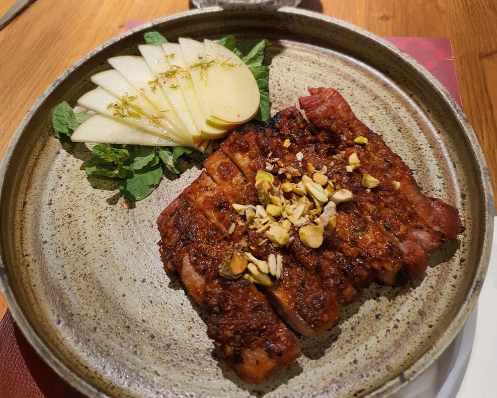 The dish of grilled pork belly with spicy, Mexicoese sauce is unique and has changed the taste of the dish at home. Photo: Tuan Dat