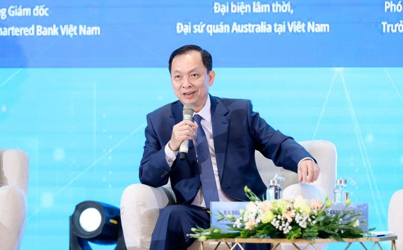 Permanent Deputy Governor of the State Bank Dao Minh Tu spoke at the Workshop "Women in Banking integrate with the digital transformation process". Photo: Hoang Giap