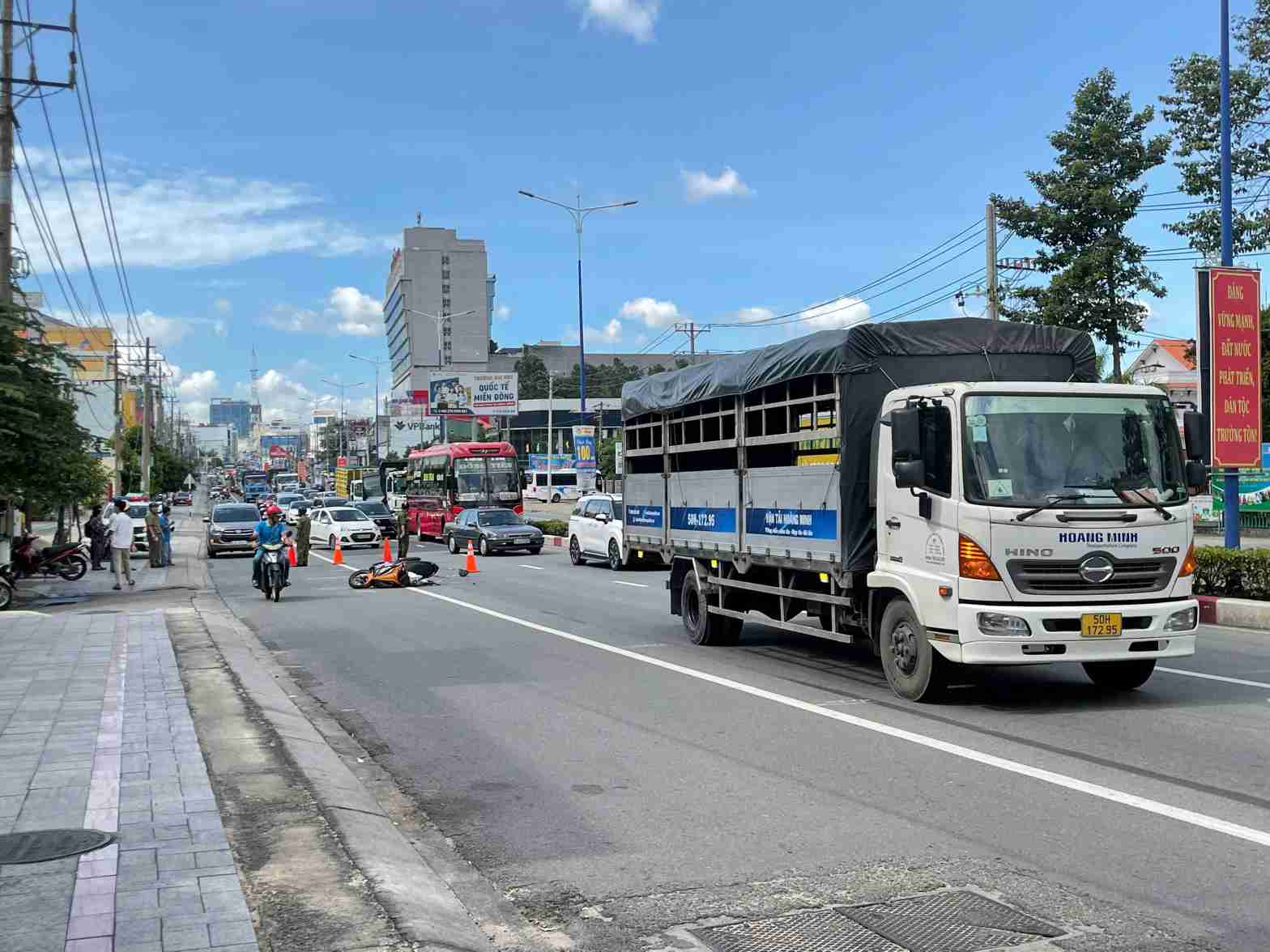 Scene of the accident between a truck and a motorbike. Photo: Dinh Trong