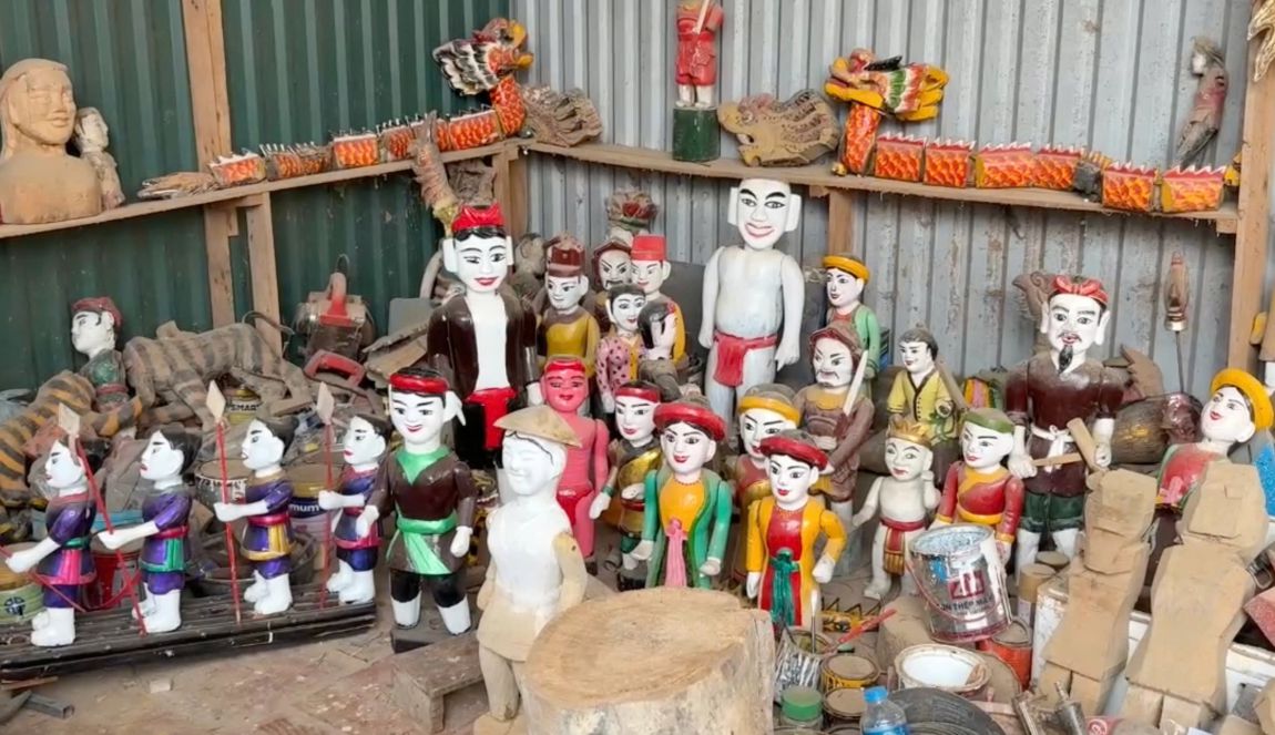 breathing life into the wood, artisans keep the traditional water puppetry in the heart of the capital. Photo: My Linh